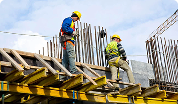 Workers on formwork at a construction site